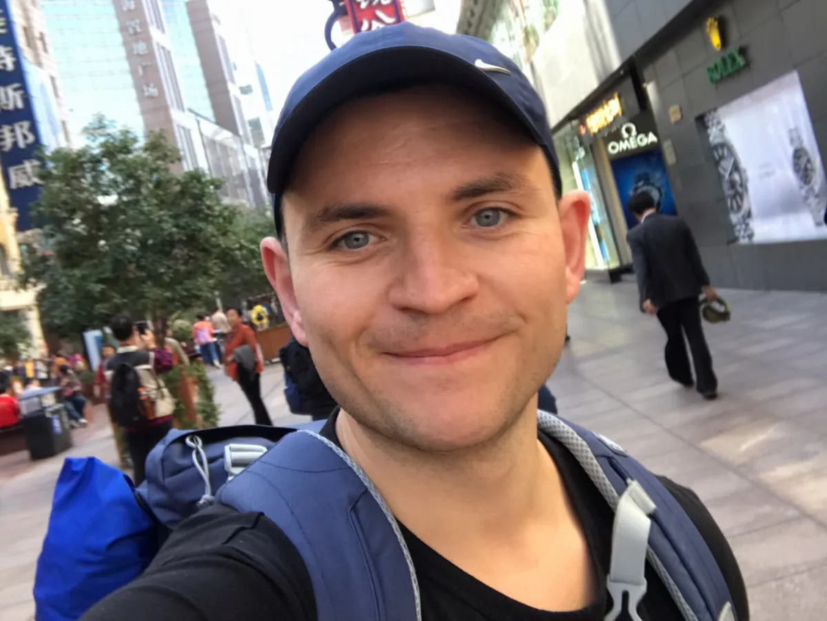 Michal Sieroslawski travelling in Shanghai with a backpack